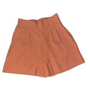 Rachael pleated wide leg high rise orange shorts size medium NWOT